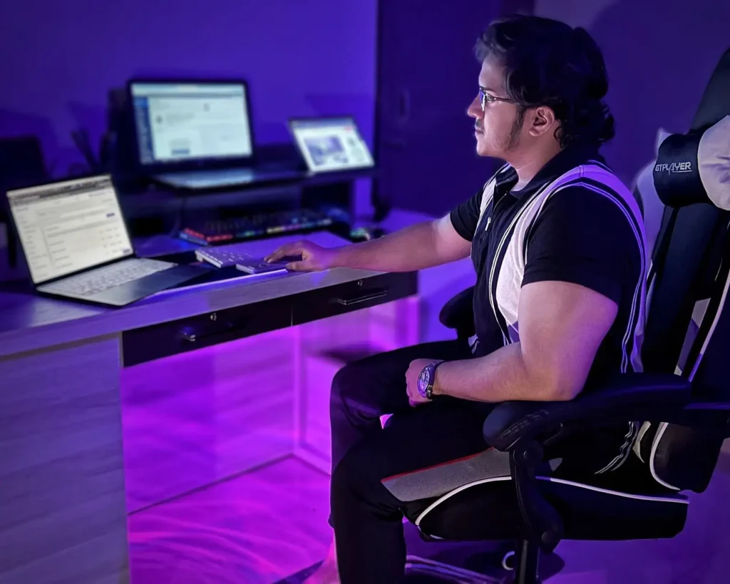 Shakir Azim SEO Digital Growth Expert working on laptop